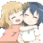 a couple of anime girls hugging each other .