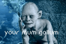 a statue of gollum from the lord of the rings is talking on a cell phone in a cave .