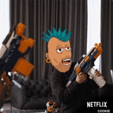 a man with a mohawk holding a nerf gun