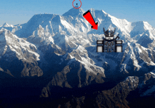 a snowy mountain with a red arrow pointing to it