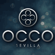 a logo for occo sevilla is shown on a blue background