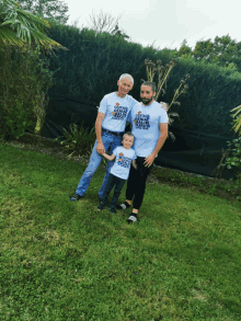 two men and a boy wearing matching shirts that say " saving lives matters "