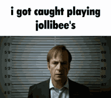 a picture of a man in a suit and tie with the caption i got caught playing jollibee