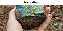 a hand is holding a piece of rock with the word forrealium written above it