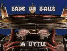 a close up of a machine with the words zaps ur balls a little on it .