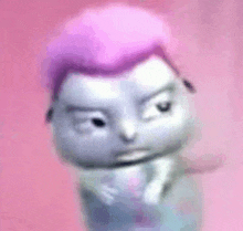 a close up of a doll with pink hair making a funny face .