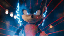 sonic the hedgehog from the movie sonic the hedgehog is surrounded by lasers and looks angry .