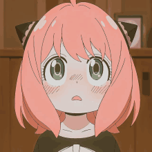 a girl with pink hair and green eyes has a cat ear