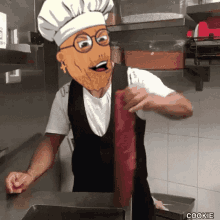 a man in a chef 's hat is holding a piece of meat in a kitchen