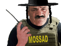 a man holding a walkie talkie with the word mossad on his chest