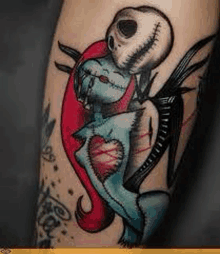 a tattoo of jack and sally from the nightmare before christmas .