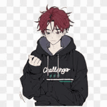 a boy with red hair is wearing a hoodie and holding a cell phone .