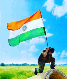 a man in a military uniform is holding a flag over a pipe