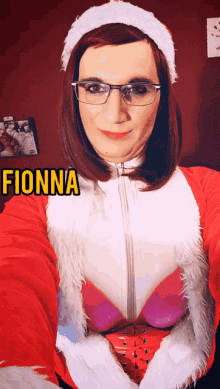 a woman in a santa costume has fionna written on the bottom