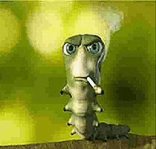 a caterpillar is smoking a cigarette with smoke coming out of it 's mouth .