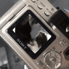 a close up of a sony camera showing a black and white image