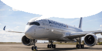 a large air france airplane is parked on a runway