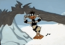 a cartoon duck is standing in the snow near a tree trunk .