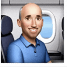 a man in a blue shirt is sitting on a plane .