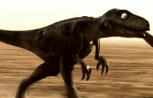 a cartoon dinosaur is walking across a dirt field .