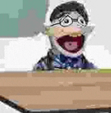 a cartoon man is sitting at a desk with his mouth open and glasses on .