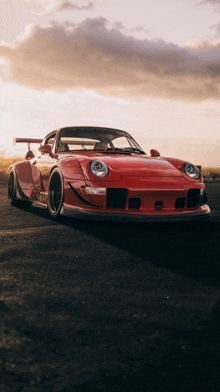 a red sports car with the word gt on the front