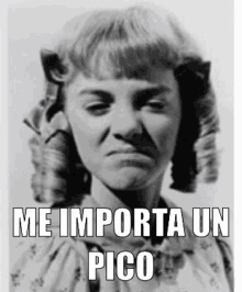 a black and white photo of a woman with a caption that says me importa un pico .