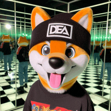 a dog mascot wearing a dea beanie and a sweatshirt