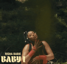 a picture of a woman with the words risha babie baby on it