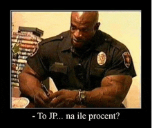 a very muscular police officer is signing a document with a pen .