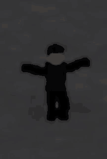 a blurry picture of a roblox character with his arms outstretched in the dark .