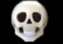 a close up of a white skull with black eyes on a black background .