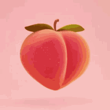 a peach with a green leaf on it is floating in the air on a pink background .