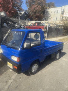 a blue truck with a new york license plate that says p45 npj