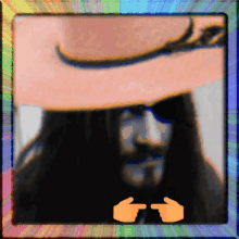 a picture of a man with long hair and a cowboy hat is surrounded by a rainbow colored frame