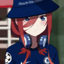 a girl wearing headphones and a bucket hat that says blue is the color