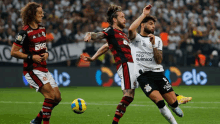 soccer players on a field with one wearing a shirt that says neo químico