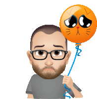 a man with glasses is holding an orange balloon with a sad cat face on it