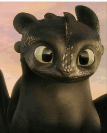 toothless from how to train your dragon is smiling and looking at the camera .