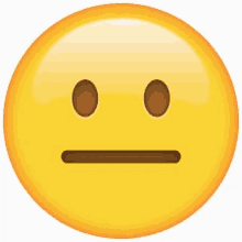 a yellow smiley face with brown eyes and a slight smirk on its face