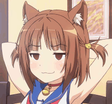 a girl with cat ears and a bell around her neck is making a funny face