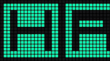 a green and black screen with a grid of squares that says ' tds ' on it .