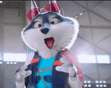 a cartoon husky wearing sunglasses and a blue shirt that says low