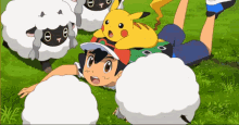 a boy is laying on the grass with a pikachu on his head