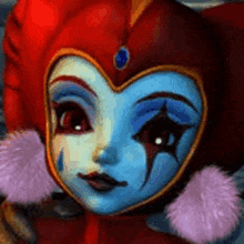 a close up of a cartoon character 's face with a red hat and blue face paint .