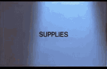 the word supplies is displayed on a blue background .