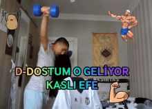 a man is lifting a blue dumbbell with the words d-dostum o geliyor kasli efe behind him