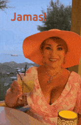 a woman wearing an orange hat is holding a drink with the words jamas written above her