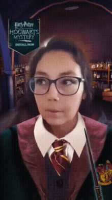 a girl wearing glasses and a harry potter hogwarts mystery mask