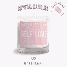 a wakeheart crystal candle says self love on the label